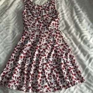 white dress with red roses